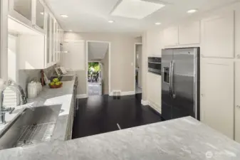 Convection microwave. large single sink. Kitchen flows a few steps out to the paver stone patio.