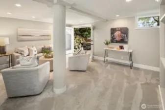 Lower level family room with private entrance. Plenty of room for all sorts of activities.