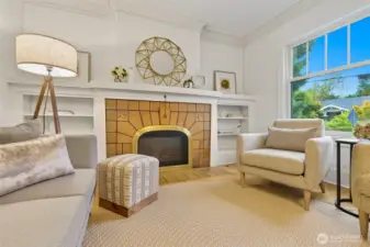 A timeless gas fireplace adds warmth and character to the home. Beautiful built-ins, perfect for highlighting your artwork or treasured pieces.