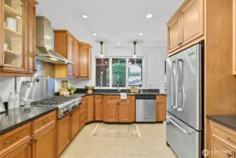 Enjoy cooking with top-of-the-line appliances in this stunningly kitchen.