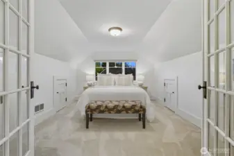 Expansive primary bedroom with plenty of room to relax.