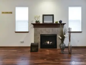 Beautiful Hearth and Tile wrapped Gas fireplace. Enjoy for cozy evenings.