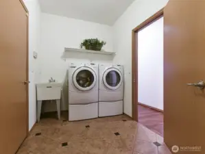 Extra storage closet in utility room.