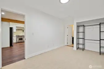 The Primary bedroom is just off the main living space and has a closet organizer. New carpet in all the bedrooms!