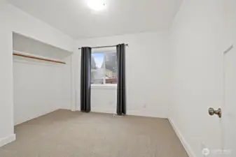 The 3rd bedroom is at the back of the house, just off the dining space and next to the main full bathroom. Fresh new carpet here too!