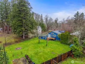 Great picture shows the huge, .3 acre yard with garden space. The property has 7 berry bushes & 3 fruit trees (cherry, plum and fig)! You can also enjoy the local herd of elk when they visit along the back fenceline!