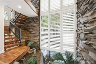 Indoor pond and striking 20' indoor waterfall!