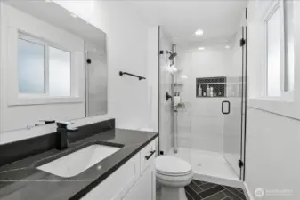 Fresh primary bath with large shower.