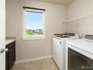 Convenient upper level laundry room means no hauling laundry baskets up and down the stairs.