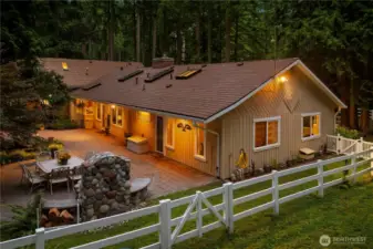Amazing patio off the rear of the house adjacent to the lower pasture.