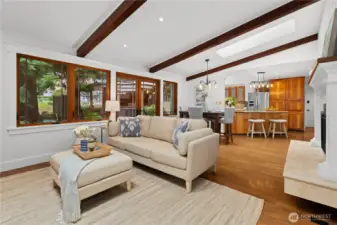 Second fireplace on this side, and an informal eating area flows into the kitchen.