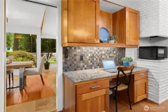 Built in desk space off the kitchen. Perfect spot for a laptop and cookbooks.