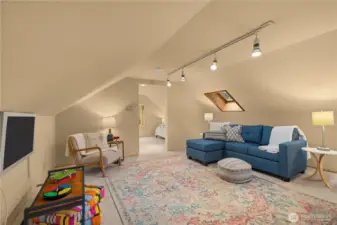 There is a very large finished space above the flex space. Entrance is off the garage.