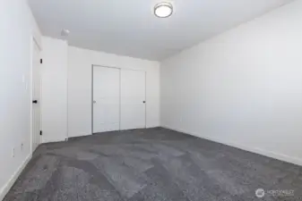 Primary bedroom with closet space.