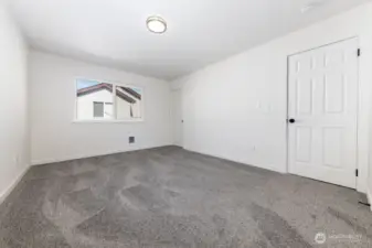 Primary bedroom with lots of natural lighting. Full bathroom connected to primary.