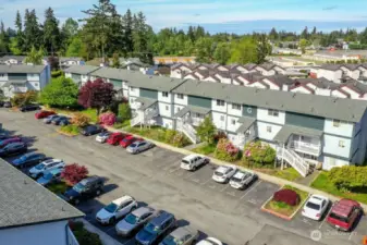 Aerial view of G Building. Designated parking space is 104, in front of unit.