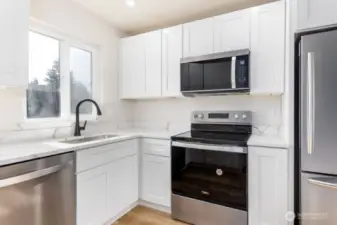 New Stainless Steel appliances modernize this kitchen space