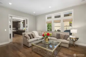 A versatile family room connects to the great room, providing a private space to unwind and relax