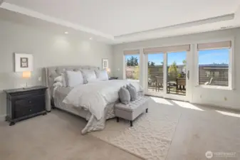 The primary suite is a private retreat, featuring the home’s best views from its deck, a spa-inspired bath and a boutique-sized closet with dedicated laundry.