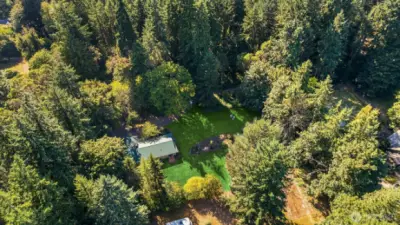 Metal Roof, showing side yard to right and back yard, lots of sunshine