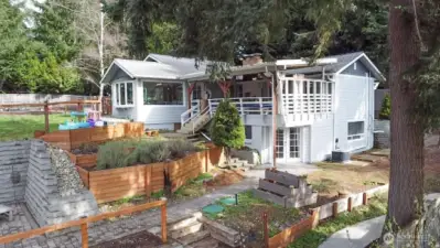Rear - terraced areas awaiting summer planting