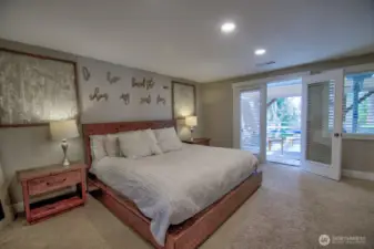 Main floor Primary with deck and view access