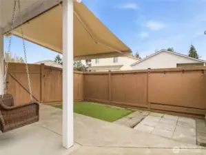 Backyard with sunsetter awning.