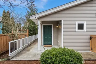 Front entry with a ramp that leads to two additional points of entry on the south side of the home.