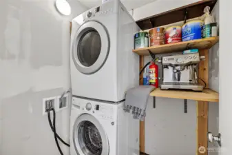 Laundry room with storage.