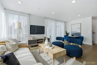 Floor to ceiling windows fills this home with natural light. All windows have adjustable Honeycomb window blinds