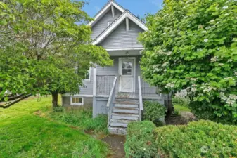 Welcome to this charming 2128 square foot home with lots of character and elements of a bygone era.  5 panel doors, original knobs and wood floors