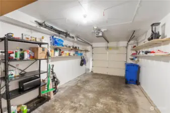 CHECK OUT THIS GOOD SIZED ATTACHED GARAGE WITH LOTS OF STORAGE AND ROOM FOR YOUR VEHICLE