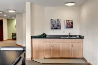 Community space with sink and counter area, perfect for easy prep and cleanup during gatherings.