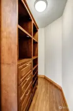 Entryway closet featuring shelves, drawers, and ample space for shoes and accessories.