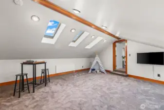 This is a whatever-you-want room.  The Seller used it as a huge sewing room.  It has been used as a gym with fitness equipment.  Maybe a good "homeschooling" room?