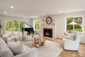 Open and effortlessly elegant—nano doors lead to a deck and private creekside retreat.