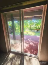 primary bedroom access to backyard/patio/jacuzzi