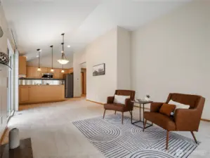 The vaulted ceilings and fresh paint in this great room add to its airy brightness.