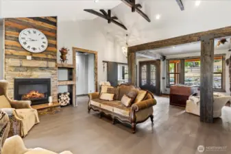 Gas fireplace in the living room looking back to entryway.