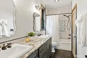 Jack and Jill bath with dual vanities.