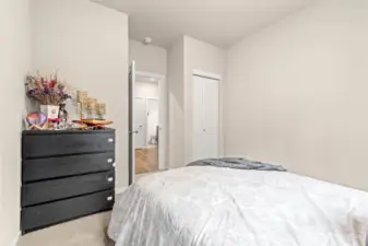 Main floor bedroom with queen bed