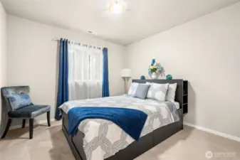 Comfortable upstairs bedroom with great square footage and a full closet to keep everything organized