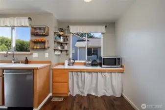 Addition counter space in kitchen makes great coffee bar or could be transformed into breakfast nook