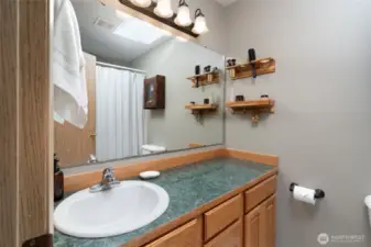 Primary bathroom with tub.