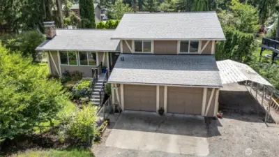 Established landscaping offers excellent curb appeal.