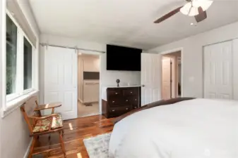 Spacious Primary bedroom offers sizable closet & ceiling fan to stay cool in summer.