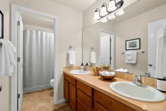 A full bathroom upstairs provides function and privacy with a separate shower/water closet.