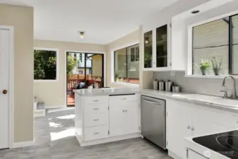 Cook's Kitchen with Abutting Breakfast Nook & Sliding Glass Doors to the Deck.