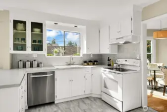 Cook's Kitchen with Abutting Breakfast Nook & Sliding Glass Doors to the Deck.