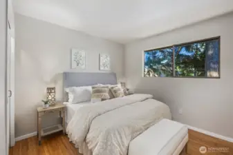 Second bedroom with hardwood floors.